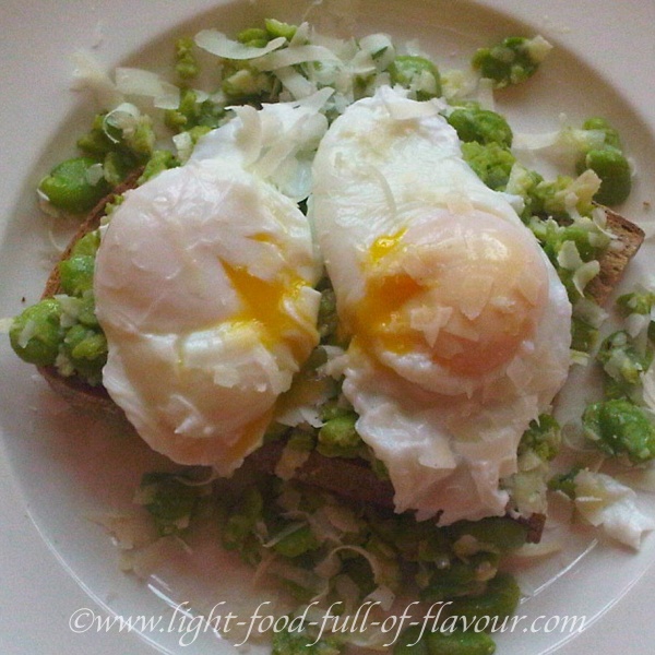 Broad Beans And Poached Eggs On Sourdough Bread