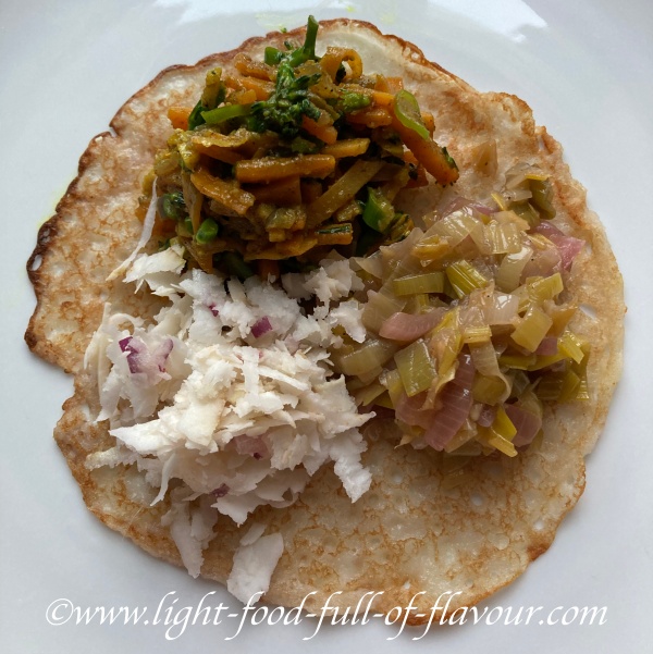 Rice pancakes with coconut sambol and stir-fried vegetables